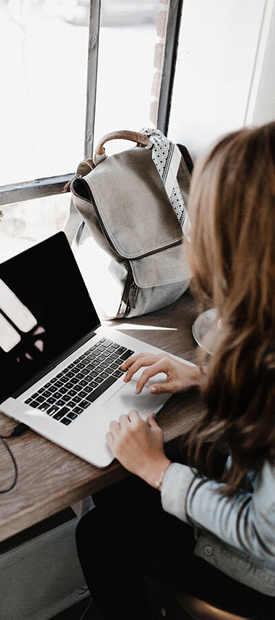 Person using a laptop on a table